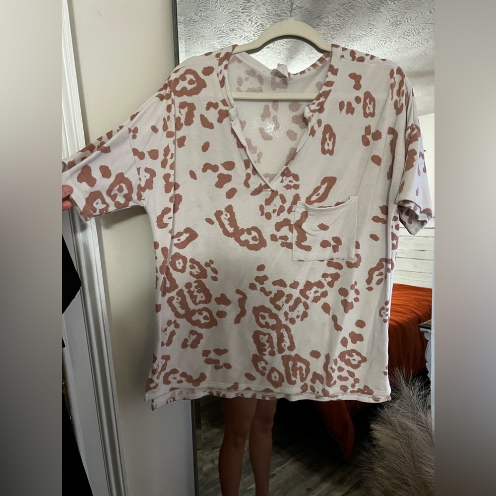 Leopard boutique top. Size L.